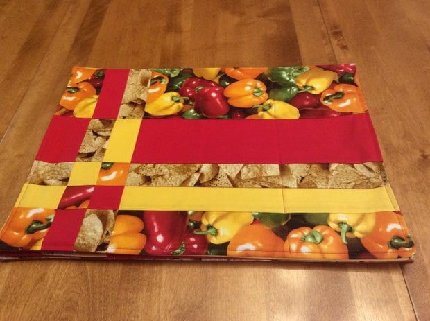 Placemats - Peppers (4) by 
Della Cronkrite