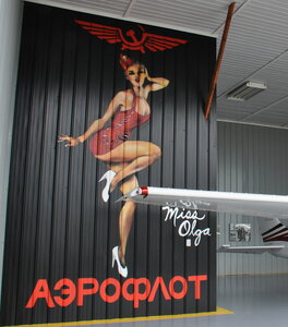 Captain Steve's Cessna 182 hangar Aeroflot stewardess "Miss Olga" photo: Lotus Johnson by 
Peter Allen