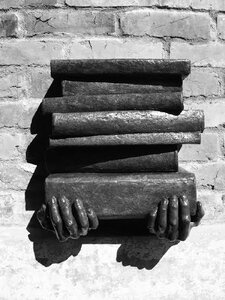 Hands of Time - Carrying Books by 
Crystal Przybille