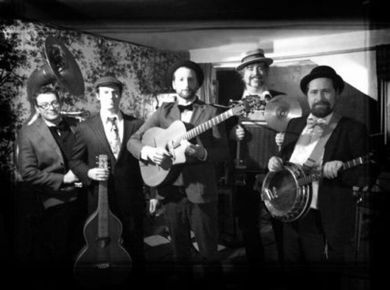 Prohibition-era Jazz, Two-step, and Country Swing played on guitar, tenor banjo, lap steel, washboard, and tuba.: Capital City Syncopators, Marcus Hissen, Avram Devon McCagherty, Reuben Wier, Christopher Herbst, Mattew Pease @ Hermann's Jazz Club Oct 14 2012 - May 21st @ Hermann's Jazz Club