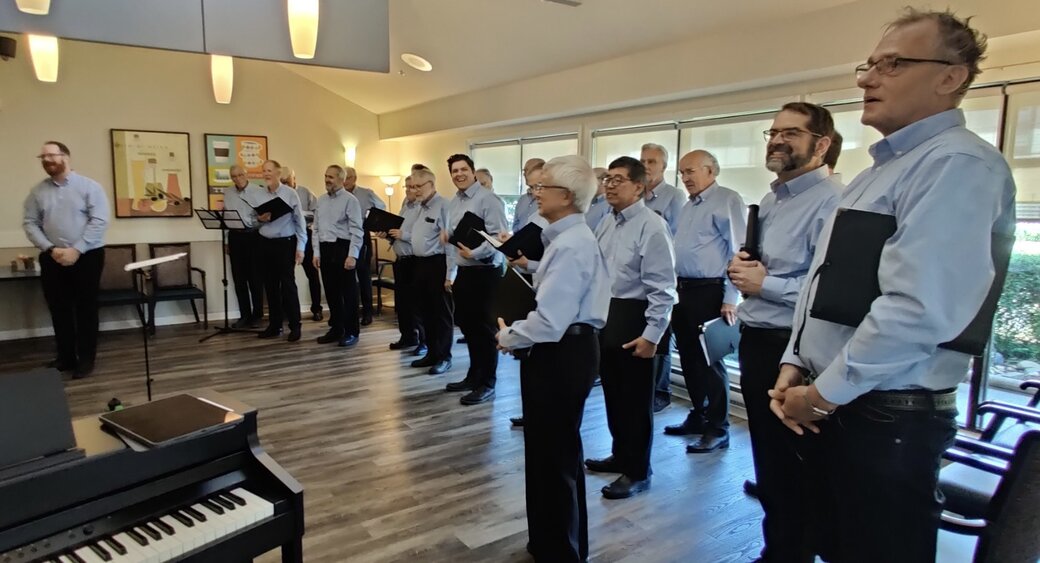 Profile Image: Choir members and Cordova Bay United at the door