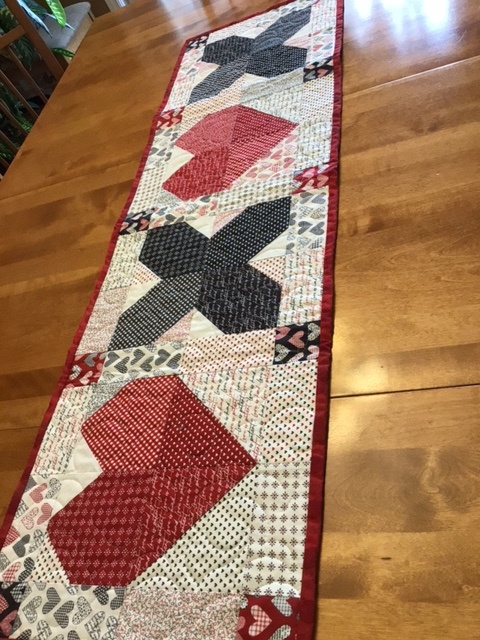 Hearts and Kisses Table Runner by 
Della Cronkrite