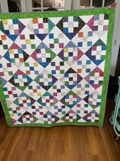 Glass Beads Nine Patch Hour Glass Quilt by 
Della Cronkrite