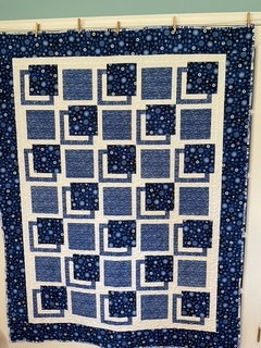 Indigo Splash Quilt by 
Della Cronkrite