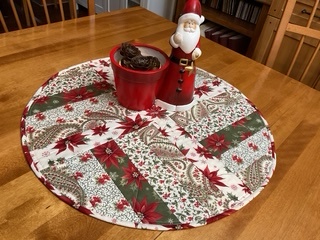 Table Topper Poinsettia by 
Della Cronkrite